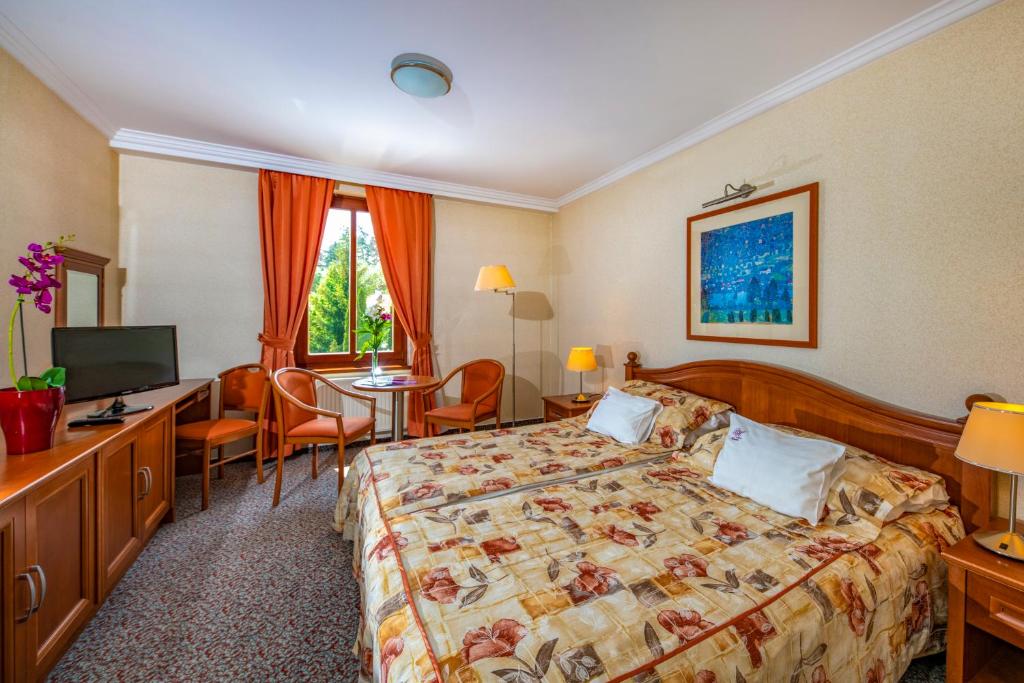 TV a/nebo společenská místnost v ubytování Betekints Wellness Hotel