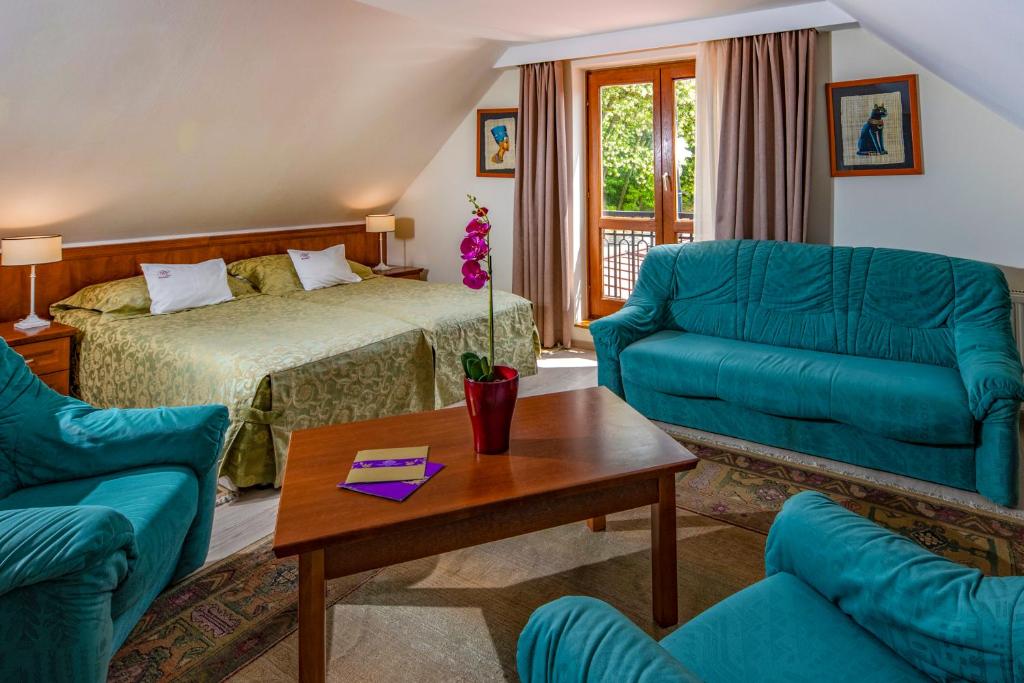Postel nebo postele na pokoji v ubytování Betekints Wellness Hotel