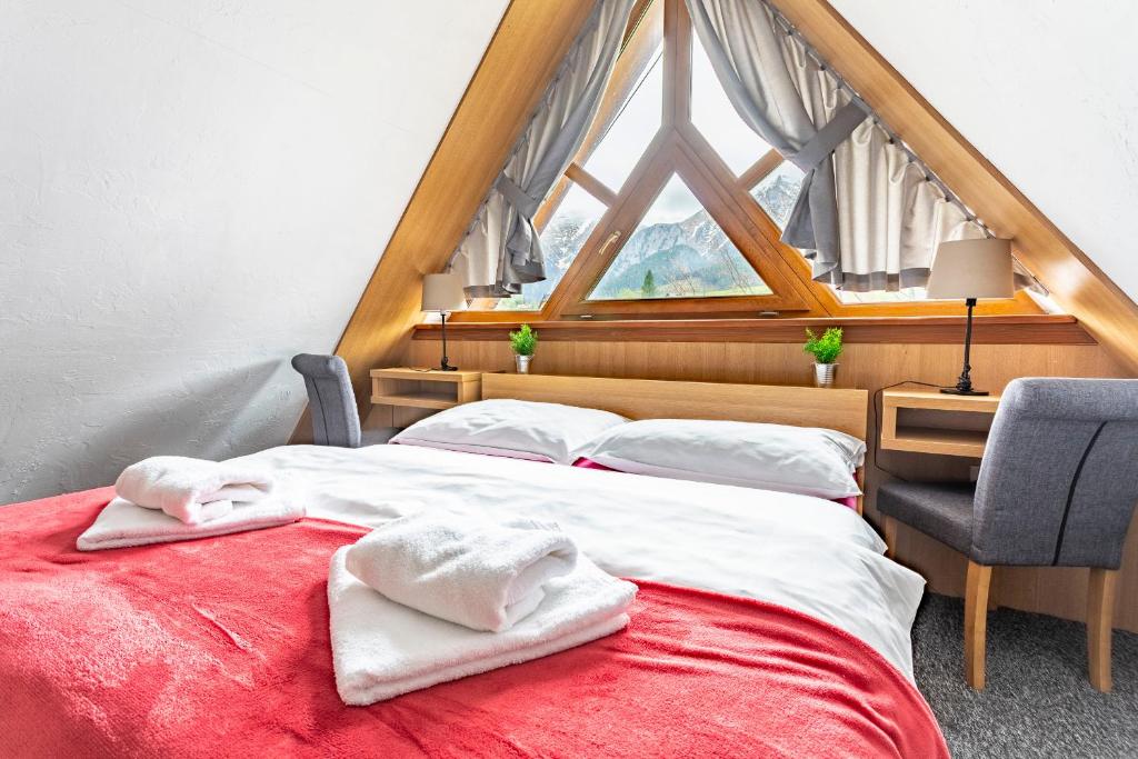 Postel nebo postele na pokoji v ubytování Pension Vasko