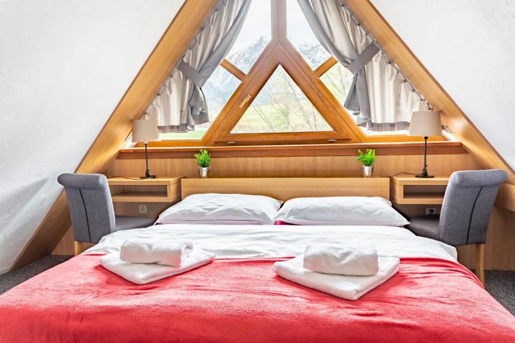 Postel nebo postele na pokoji v ubytování Pension Vasko