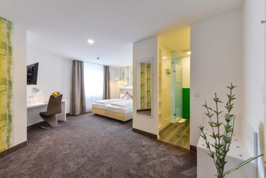 Postel nebo postele na pokoji v ubytování Hotel Günter