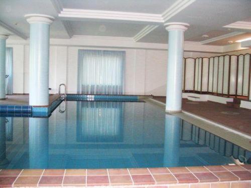 Bazén v ubytování Hotel Martino nebo v jeho okolí
