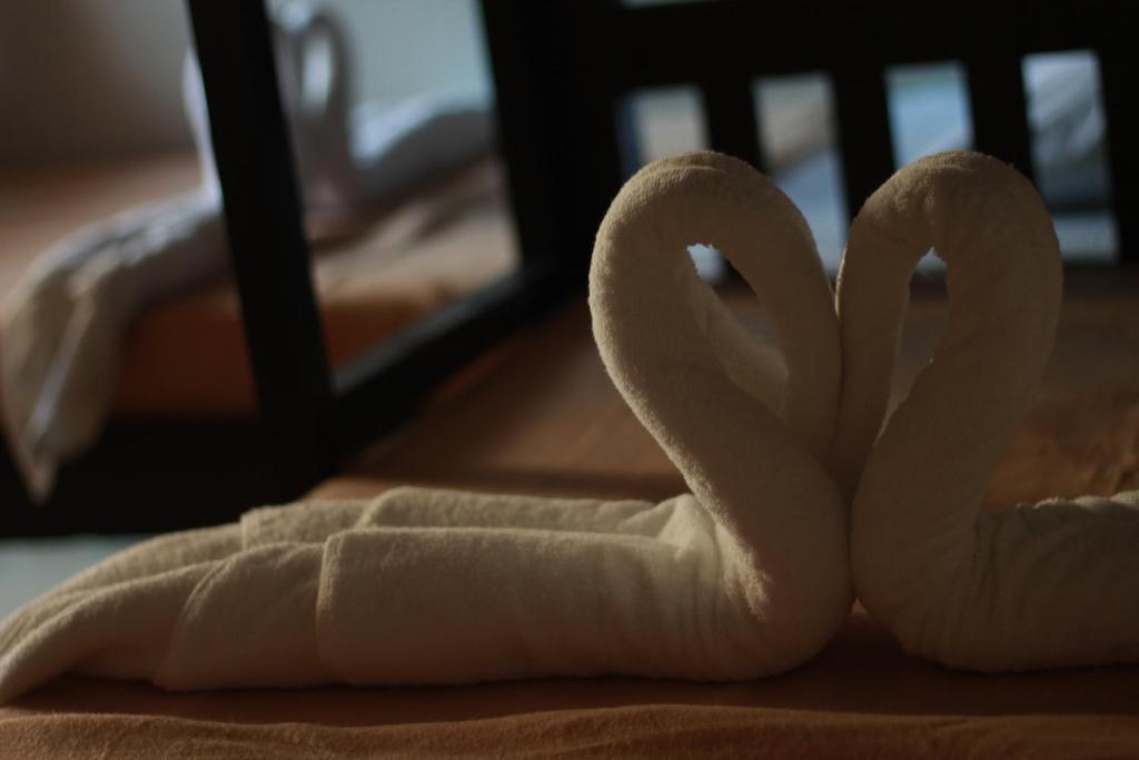 Postel nebo postele na pokoji v ubytování ParmView Inn