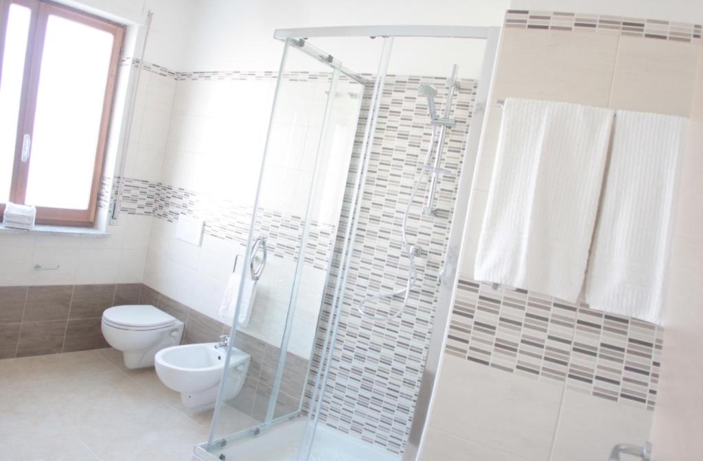 Koupelna v ubytování A'MANTIA HOTEL