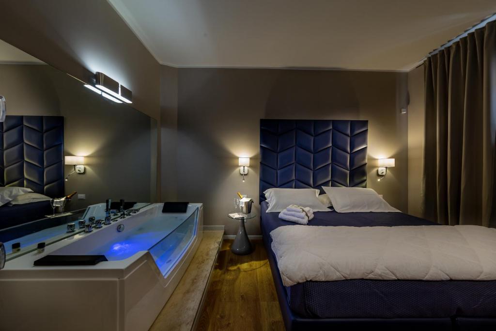 Posteľ alebo postele v izbe v ubytovaní Album Boutique Rooms