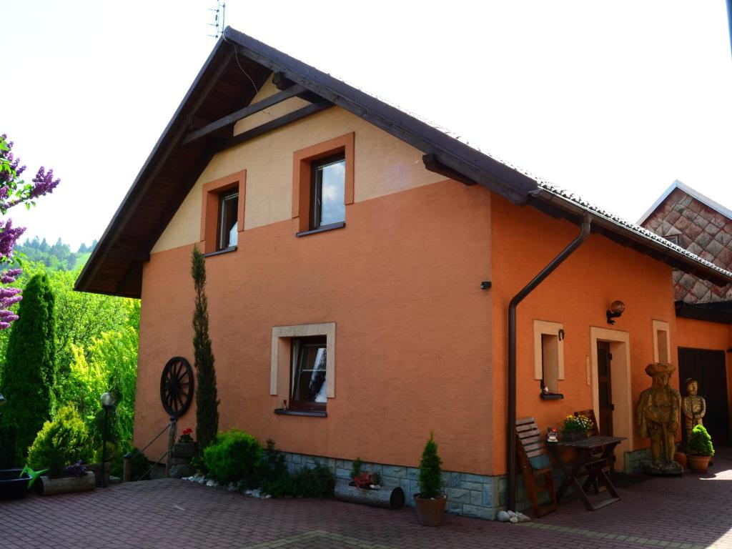 a small house with a roof at Apartments Ve Dvoře in Mosty u Jablunkova