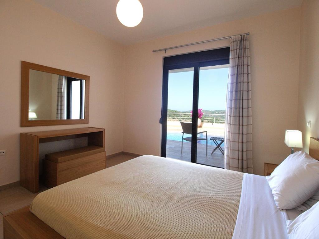 Postel nebo postele na pokoji v ubytování Villa Rotunda A