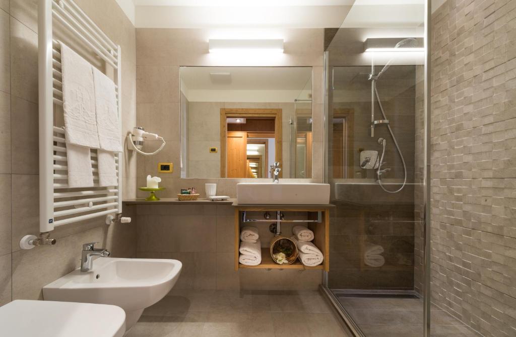 Koupelna v ubytování Hotel Ambassador