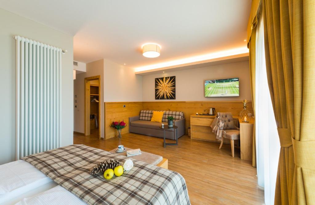 Postel nebo postele na pokoji v ubytování Hotel Ambassador