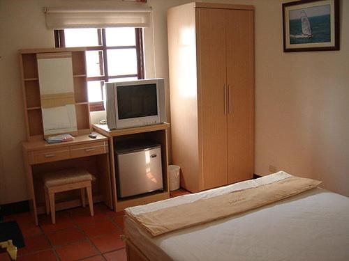 TV a/nebo společenská místnost v ubytování Makung Traditional Homestay