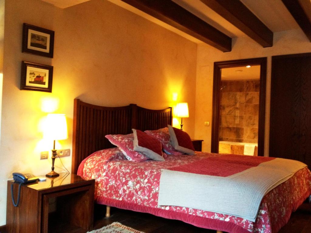 Postel nebo postele na pokoji v ubytování Hotel & Spa Casa Irene