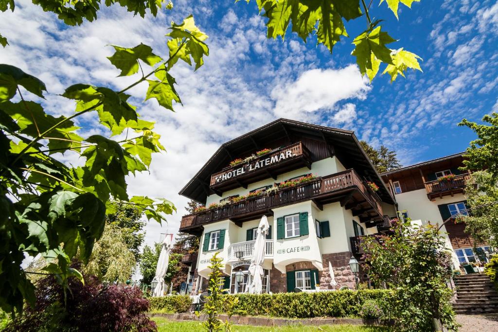 akritkritkrit inn is a boutique hotel with a view of the building at Hotel Latemar in Soprabolzano