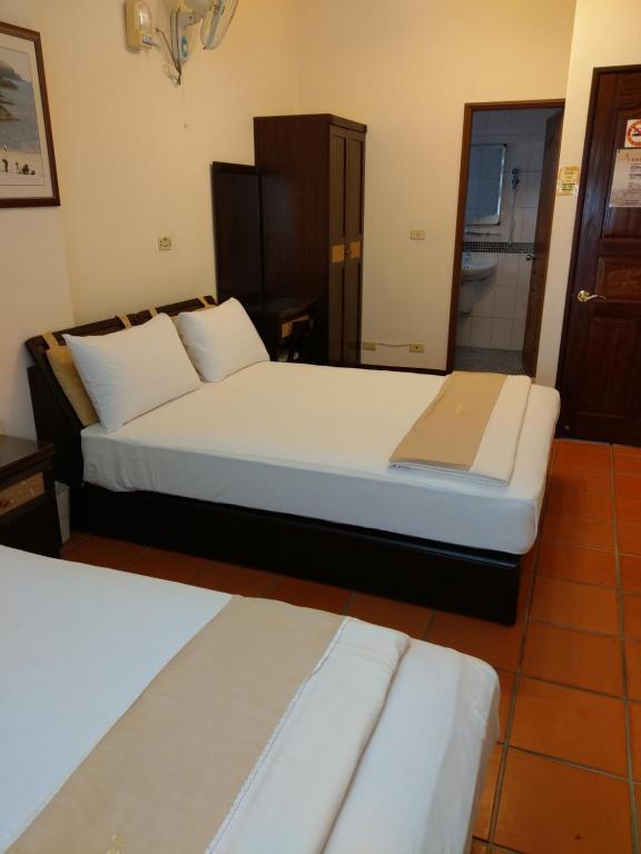 Postel nebo postele na pokoji v ubytování Makung Traditional Homestay