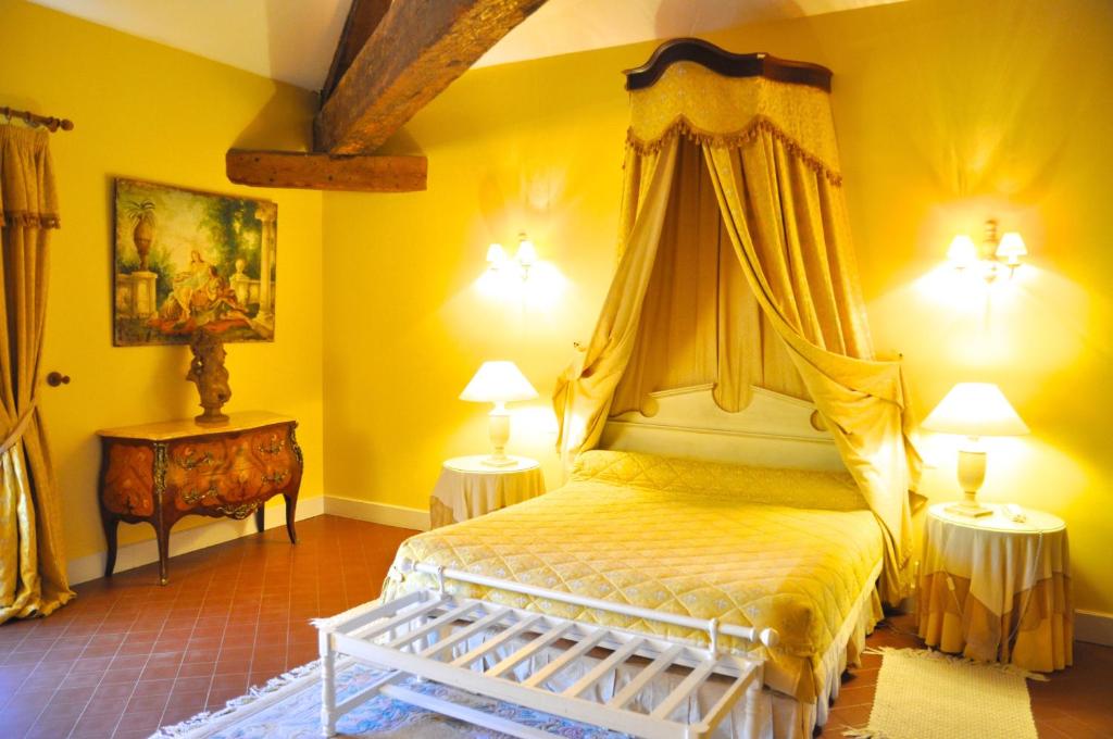 Postel nebo postele na pokoji v ubytování Hôtel Château de Cavanac