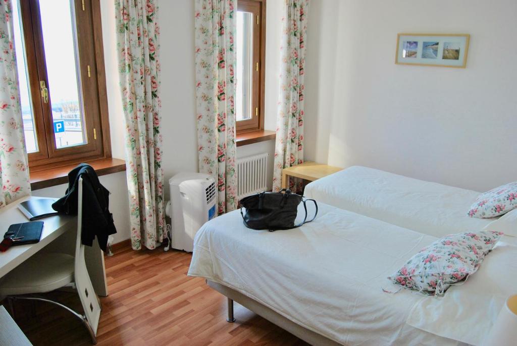 Postel nebo postele na pokoji v ubytování Casa Zen