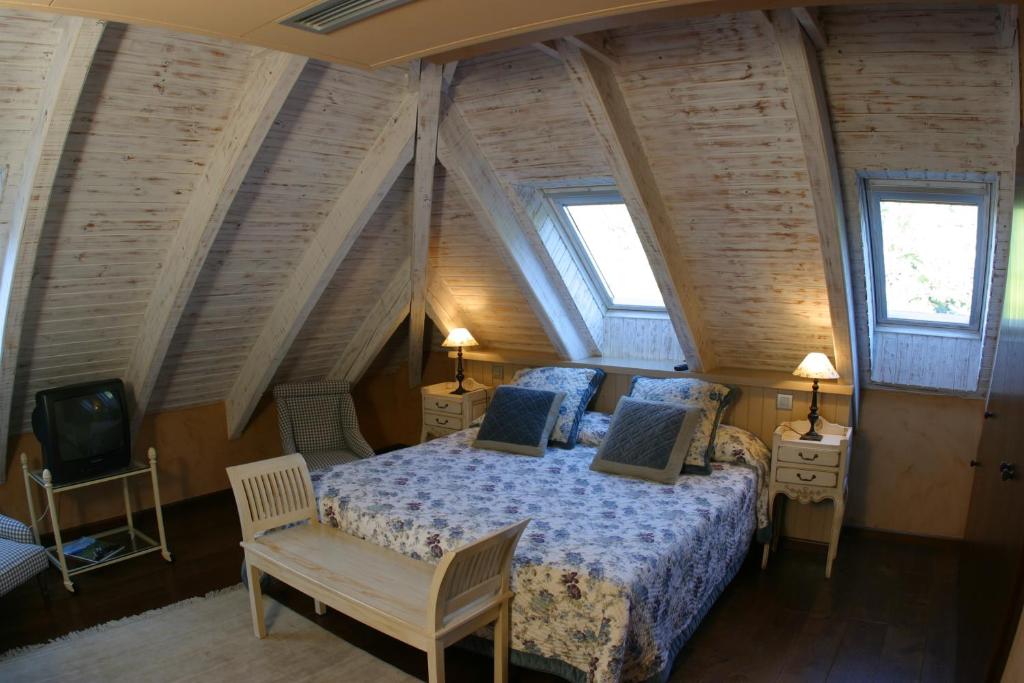 Postel nebo postele na pokoji v ubytování Hotel & Spa Casa Irene