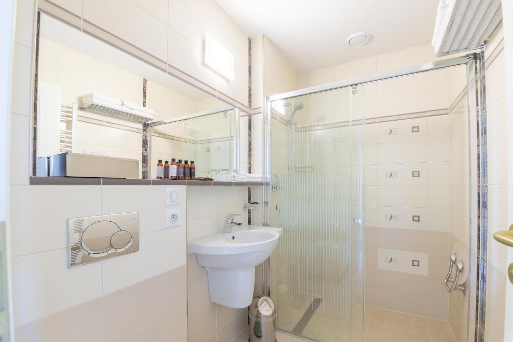 Koupelna v ubytování Boutique Hotel Corso