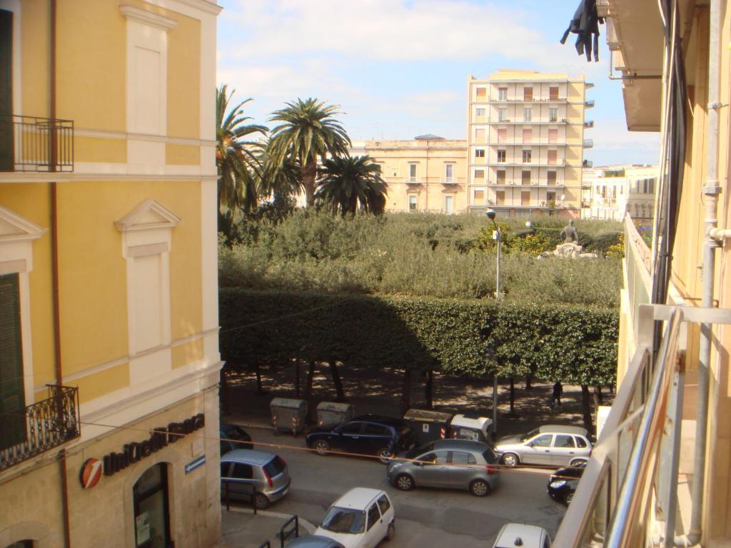 a view of a parking lot from a building at Travel and Living in Trani