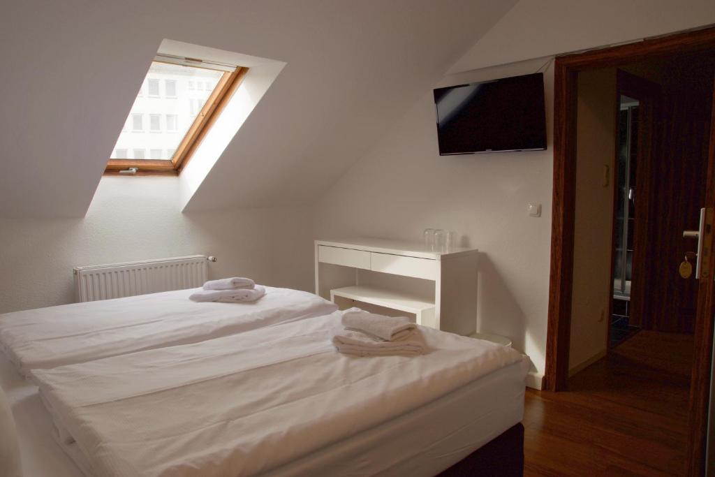 Postel nebo postele na pokoji v ubytování Hotel Teatro