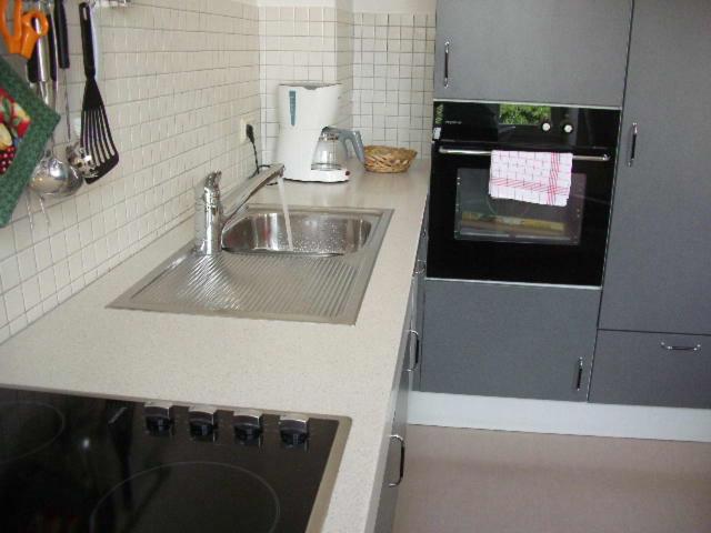Kuchyň nebo kuchyňský kout v ubytování Gästehaus Stadtmitte