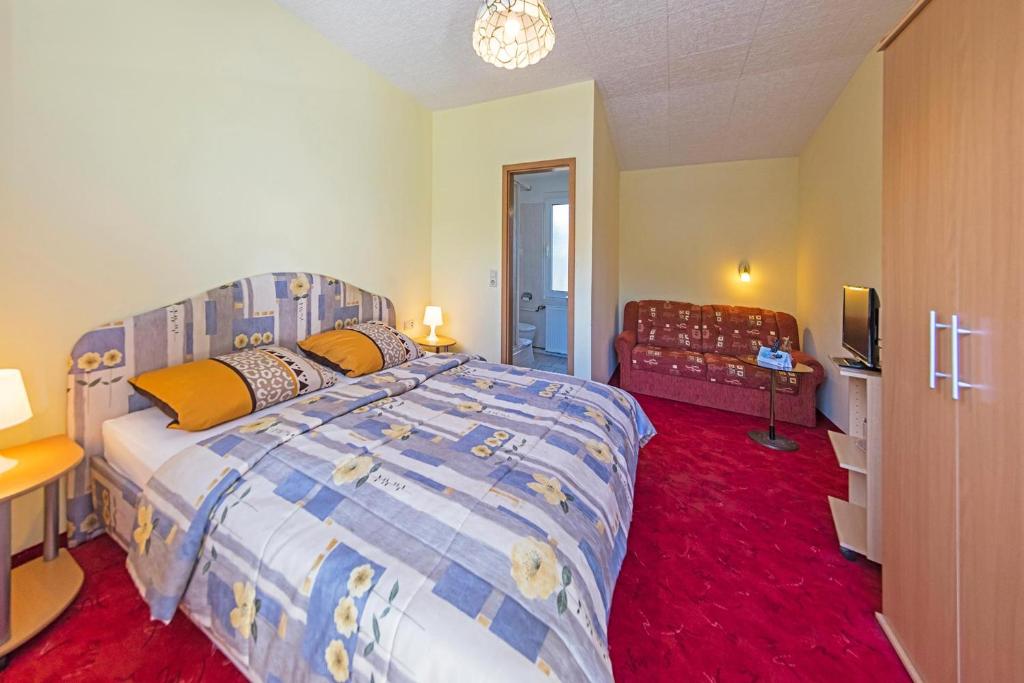 Postel nebo postele na pokoji v ubytování Hotel Waldidyll