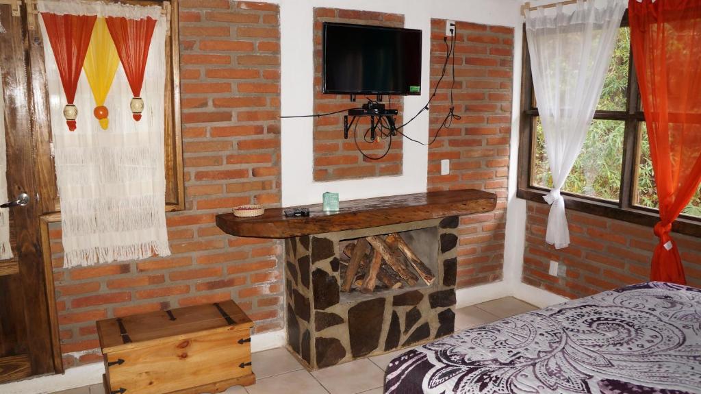 Postel nebo postele na pokoji v ubytování Rincón del Bosque