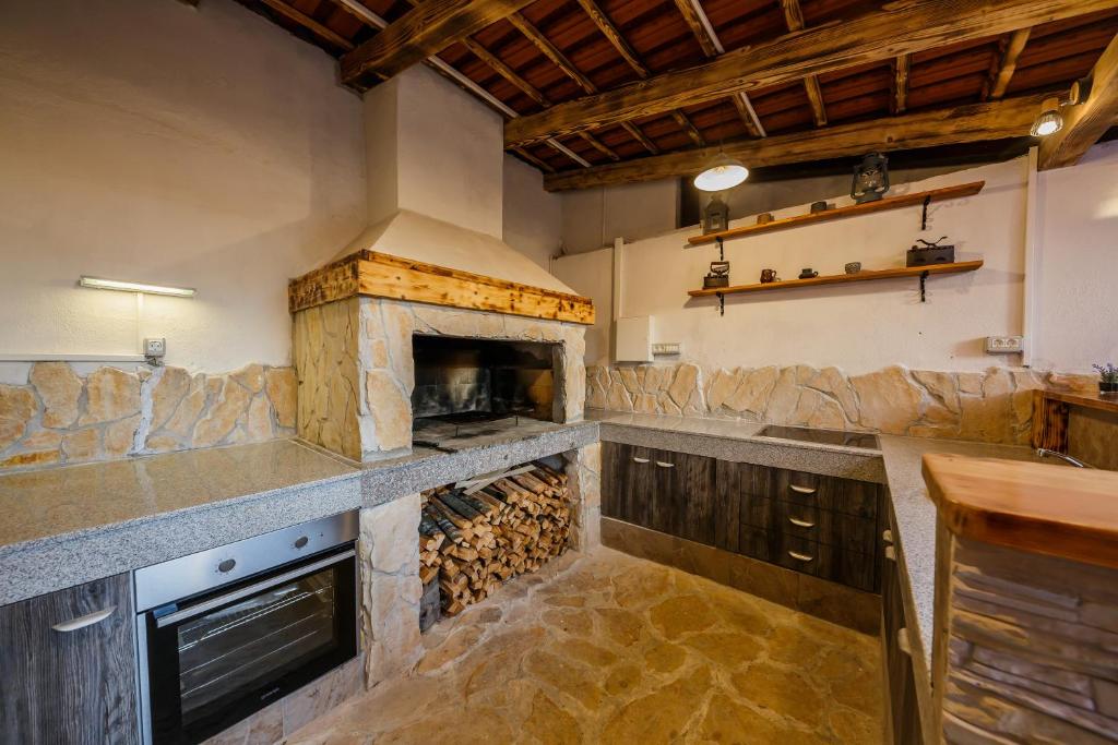 Kuchyň nebo kuchyňský kout v ubytování Villa Nora