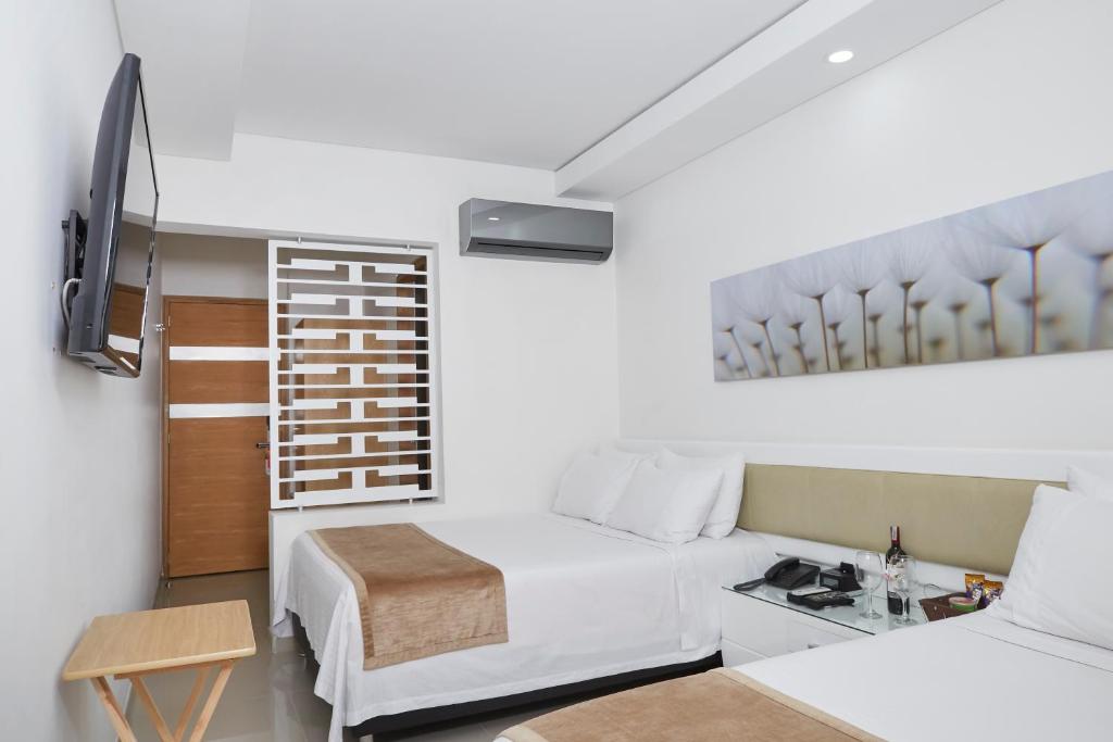 TV a/nebo společenská místnost v ubytování Hotel Zona A