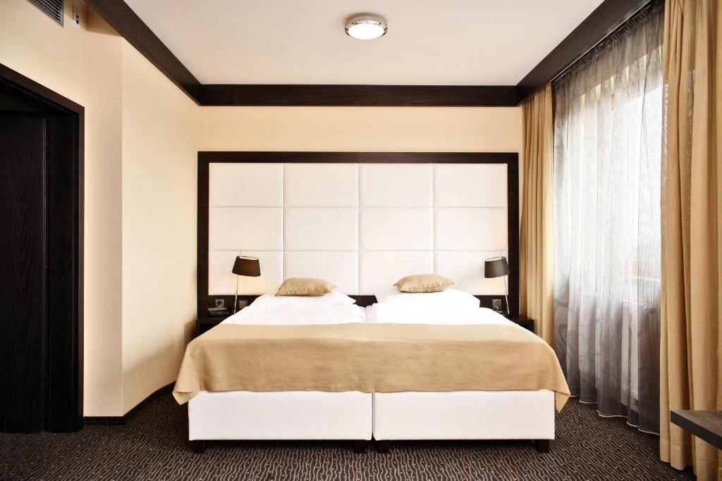 Postel nebo postele na pokoji v ubytování Hotel Lifestyle