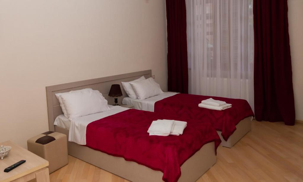 Postel nebo postele na pokoji v ubytování Holiday Rooms