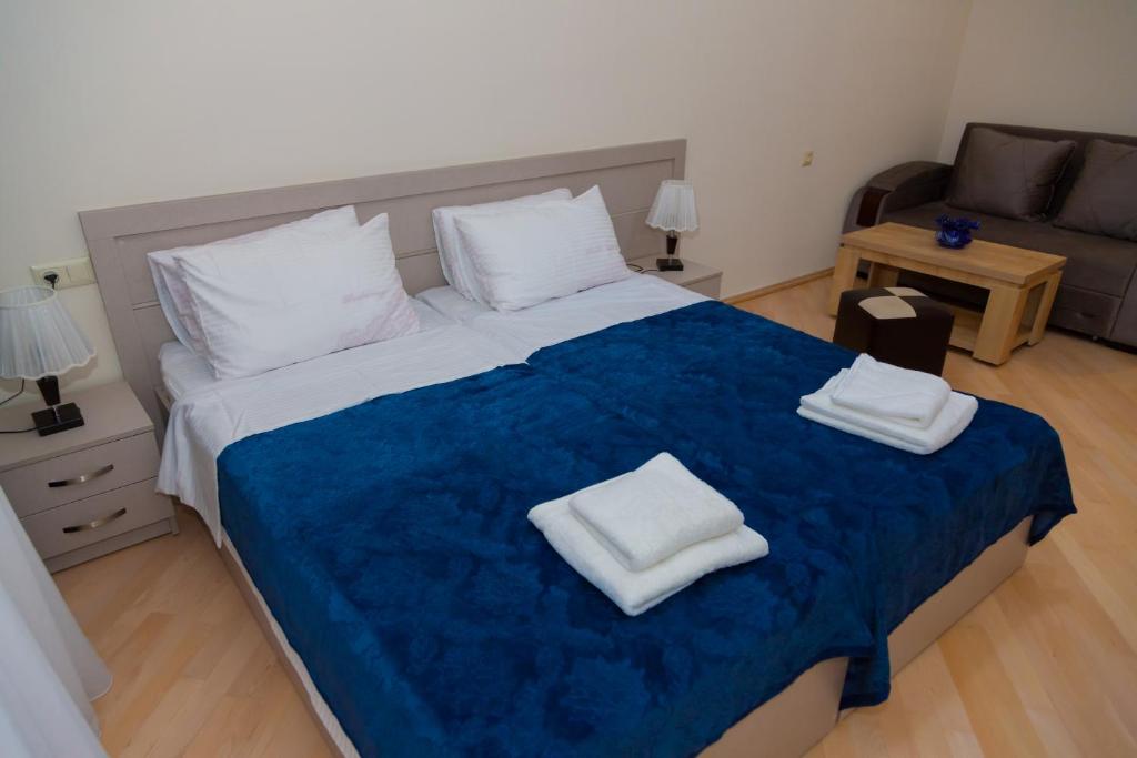 Postel nebo postele na pokoji v ubytování Holiday Rooms