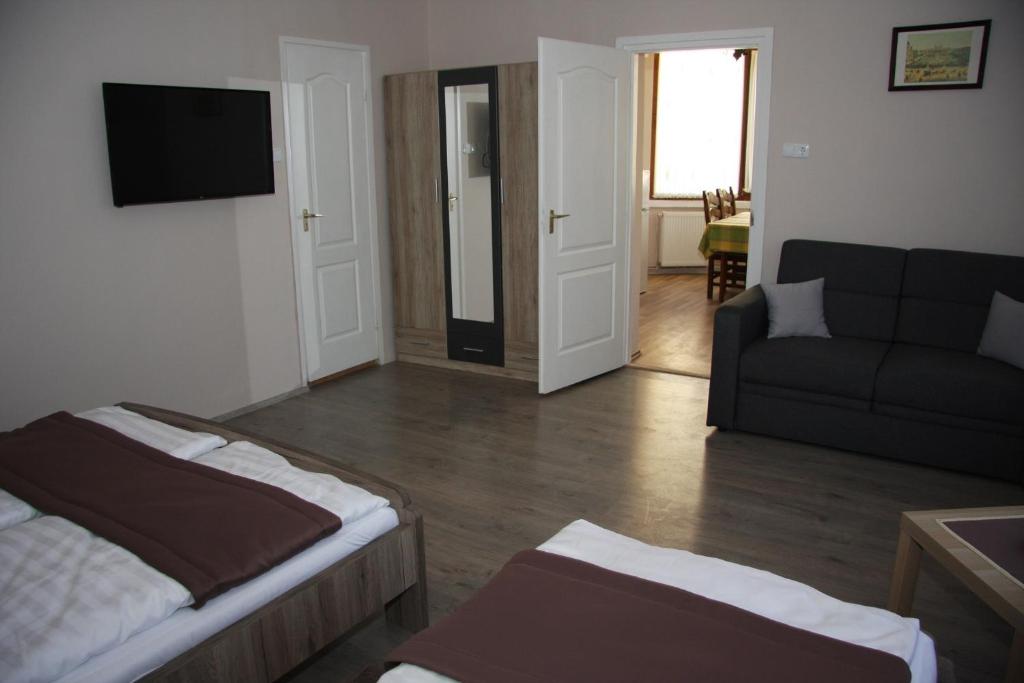Postel nebo postele na pokoji v ubytování Villa Maria Apartman