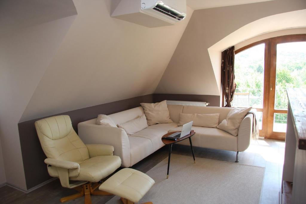 Posezení v ubytování Villa Maria Apartman