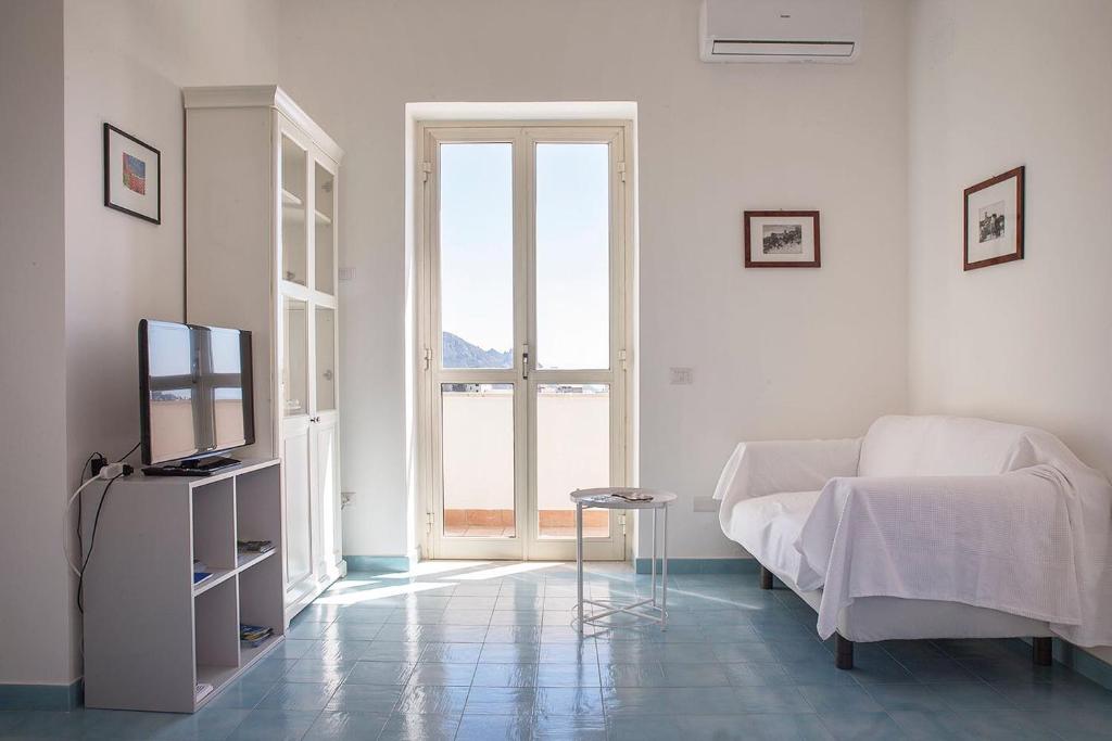 Rúm í herbergi á Dolce Vista Apartment Amalfi Coast