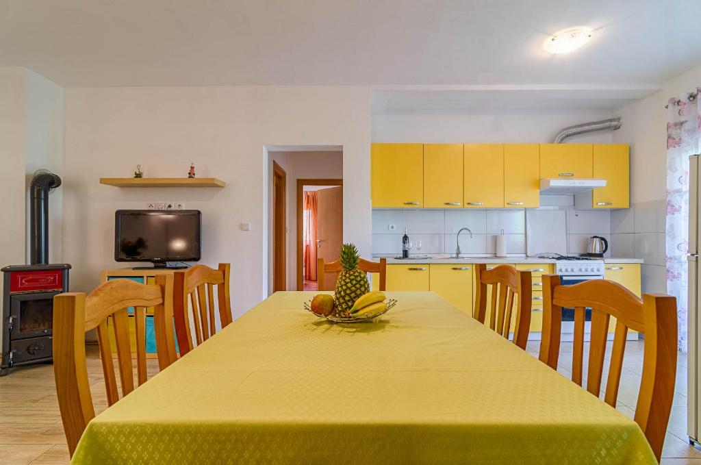 Kuchyň nebo kuchyňský kout v ubytování Apartmani Prodan 2