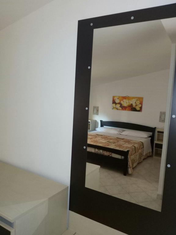 Postel nebo postele na pokoji v ubytování Noto Bedda Bed&Breakfast