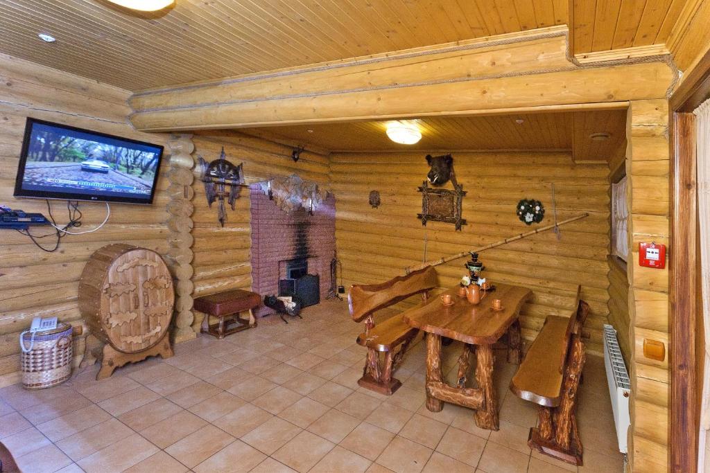 TV a/nebo společenská místnost v ubytování Kamyanka