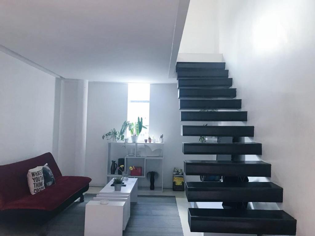 Zona de estar de FLAT06 cipete