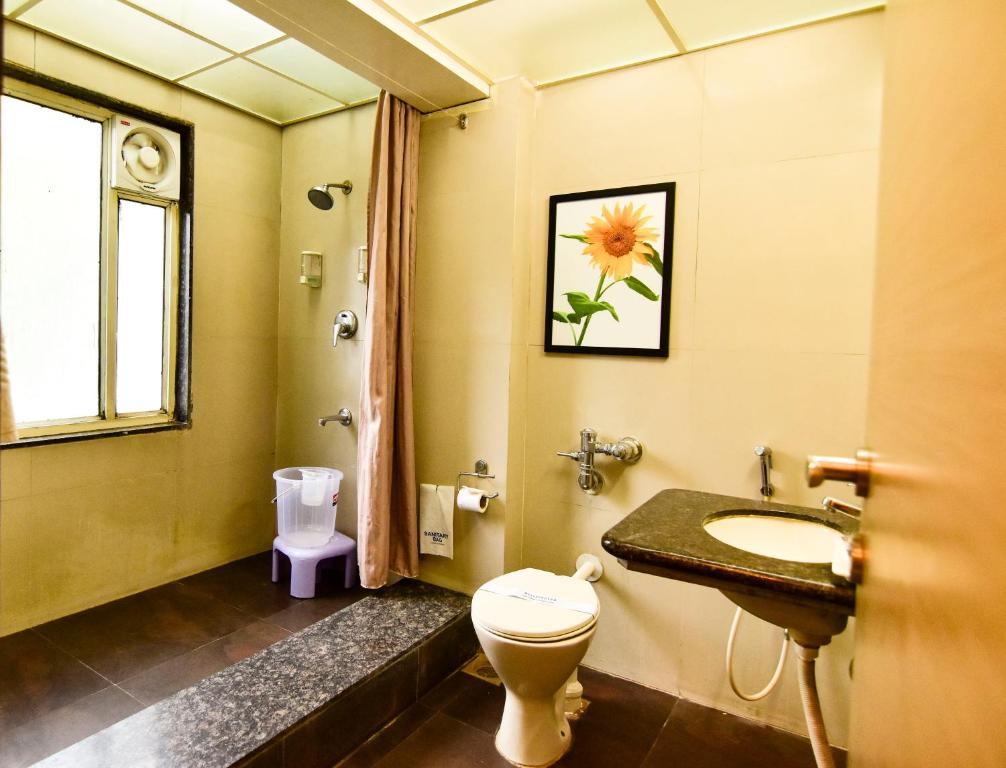 Koupelna v ubytování MY Bizz Hotel Sapna