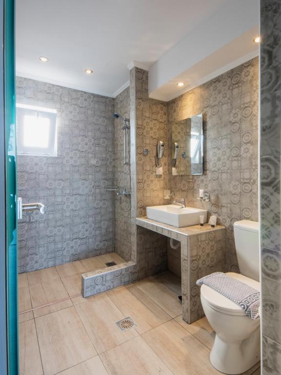 Koupelna v ubytování Elite Hotel