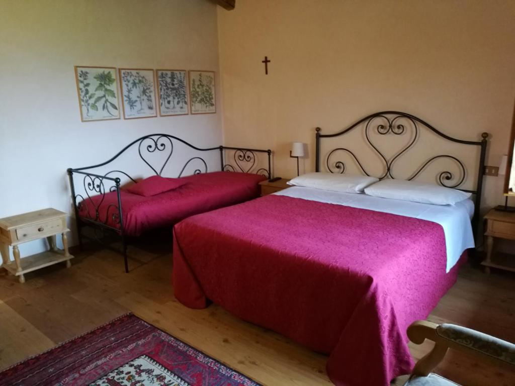 Postel nebo postele na pokoji v ubytování Costa degli Ulivi