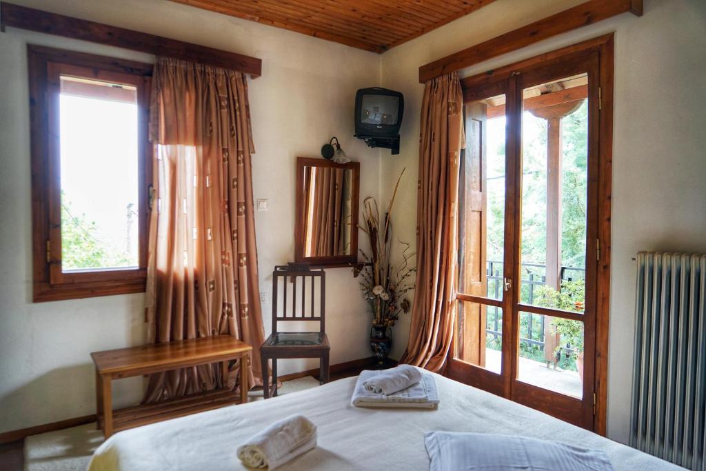 Postel nebo postele na pokoji v ubytování Guesthouse Mavrodimos