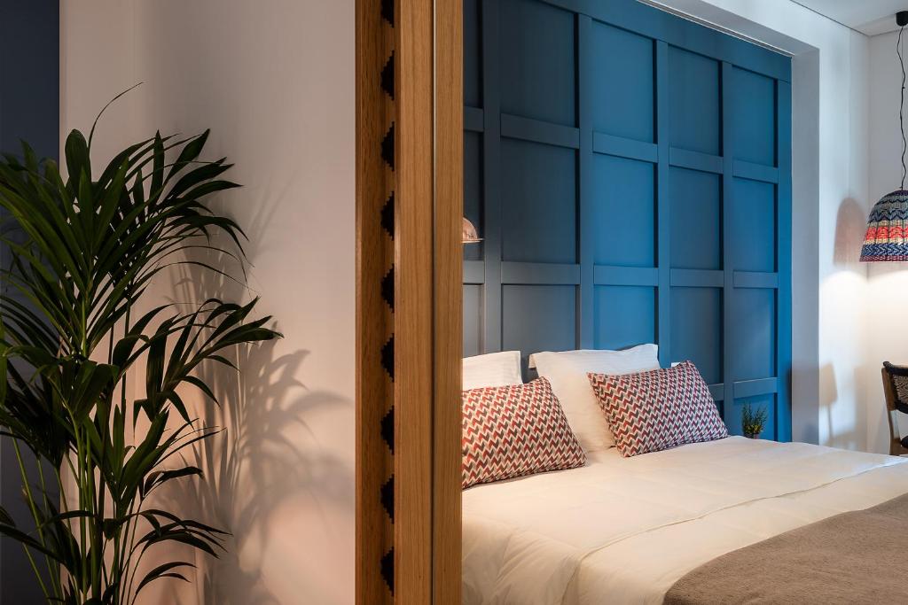 Posteľ alebo postele v izbe v ubytovaní Blue Island Luxury Apartment