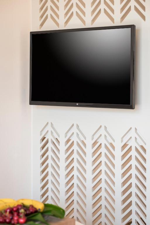 Telewizja i/lub zestaw kina domowego w obiekcie Sea & City Apartments