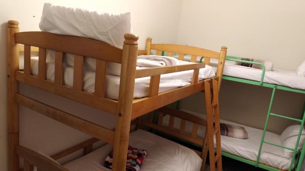 Postel nebo postele na pokoji v ubytování Kite Hostel