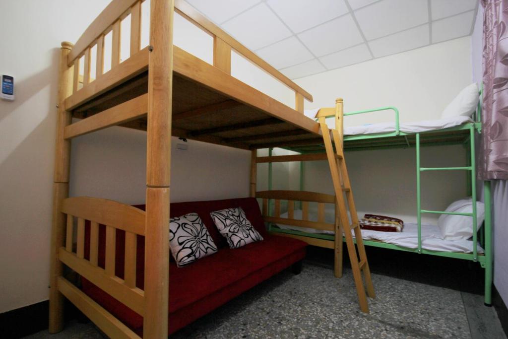 Postel nebo postele na pokoji v ubytování Kite Hostel