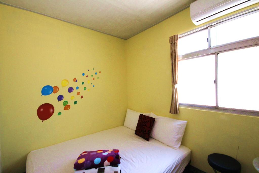 Postel nebo postele na pokoji v ubytování Kite Hostel