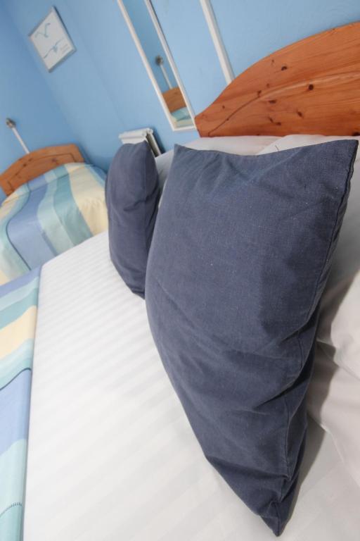 Letto o letti in una camera di Surfside Stop