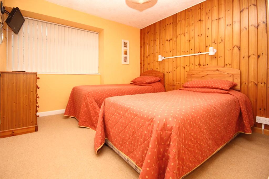 Letto o letti in una camera di Surfside Stop