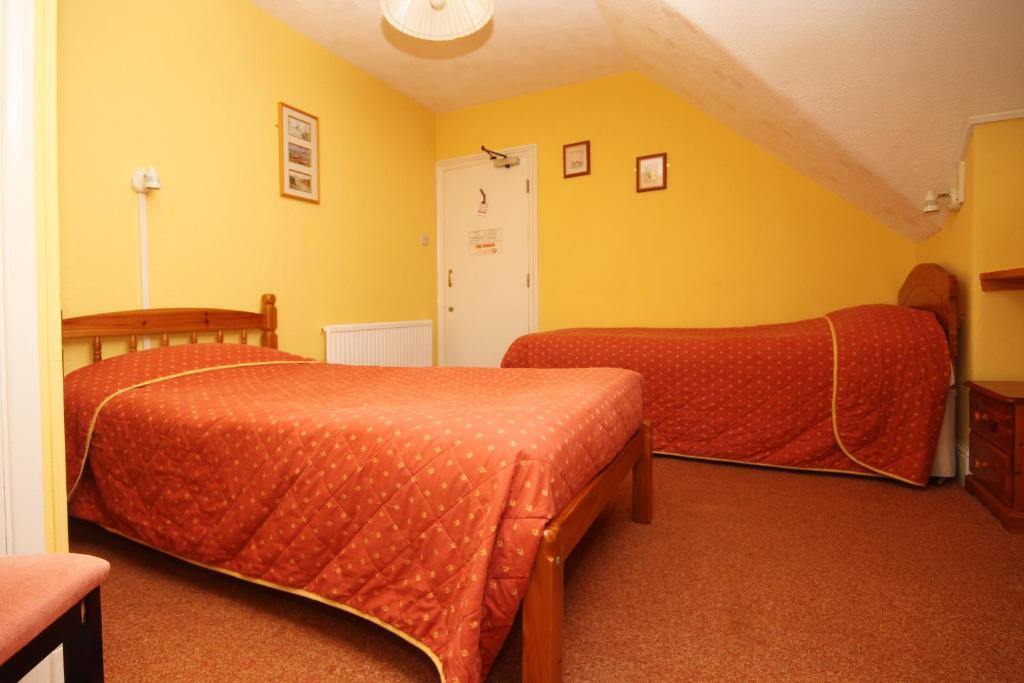 Letto o letti in una camera di Surfside Stop